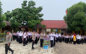 Polres Kuansing Laksanakan Program Unggulan Kapolda Riau Green Policing di SDN 019 Sungai Jering